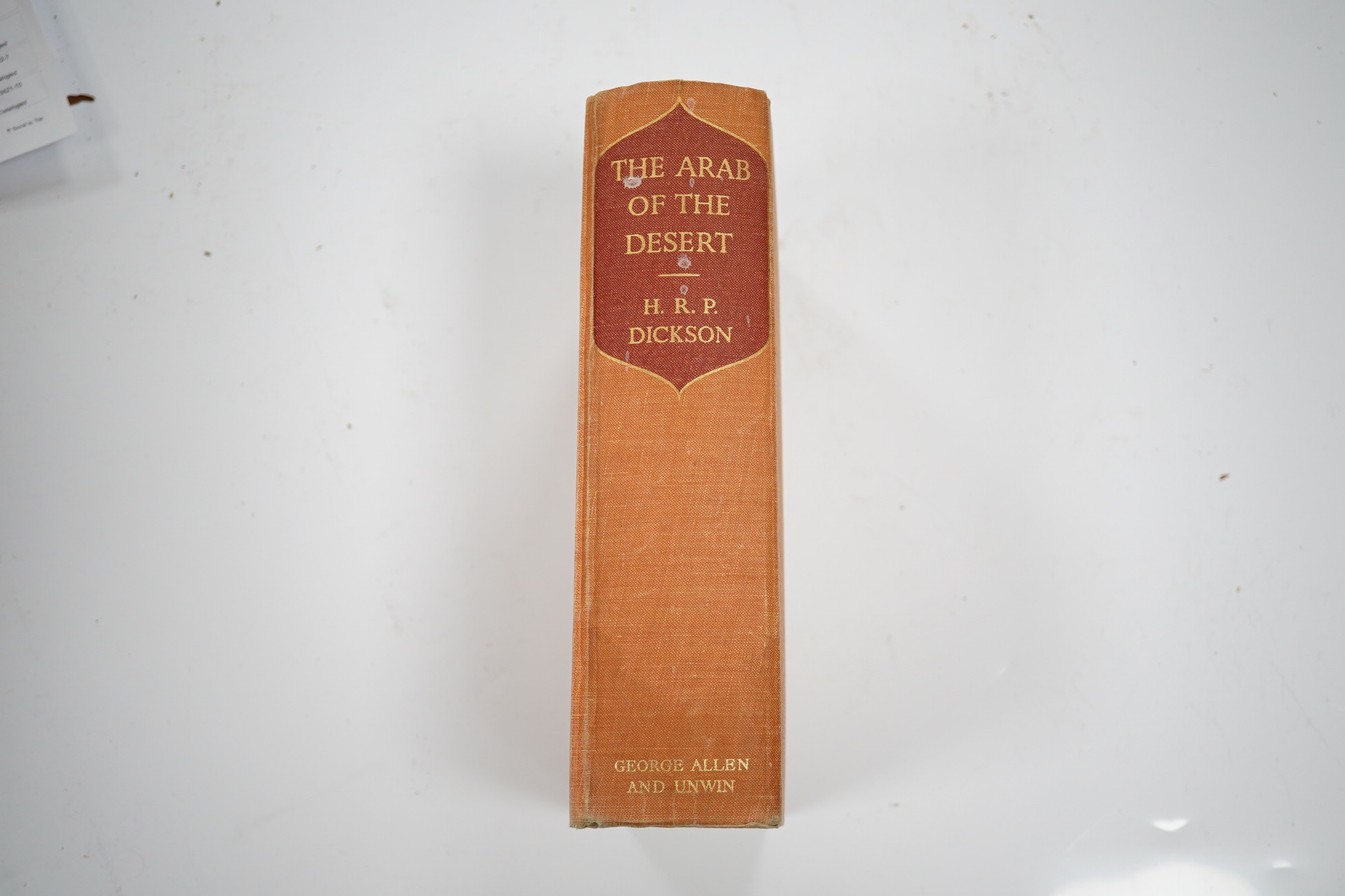 Dickson, H.R.P. - The Arab of the Desert. First Edition. num. plates (some coloured) and text illus., 6 folded tables and 7 (ex8) folded maps under end flap; publisher's gilt cloth, thick 8vo. 1949